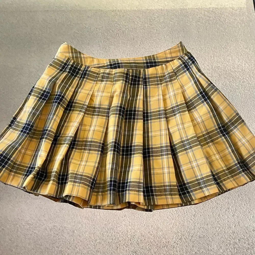 Bundle of pleaded plaid mini skirts
